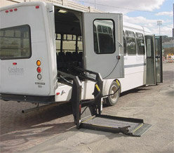 A Creighton shuttle bus equipped with a wheelchair lift.